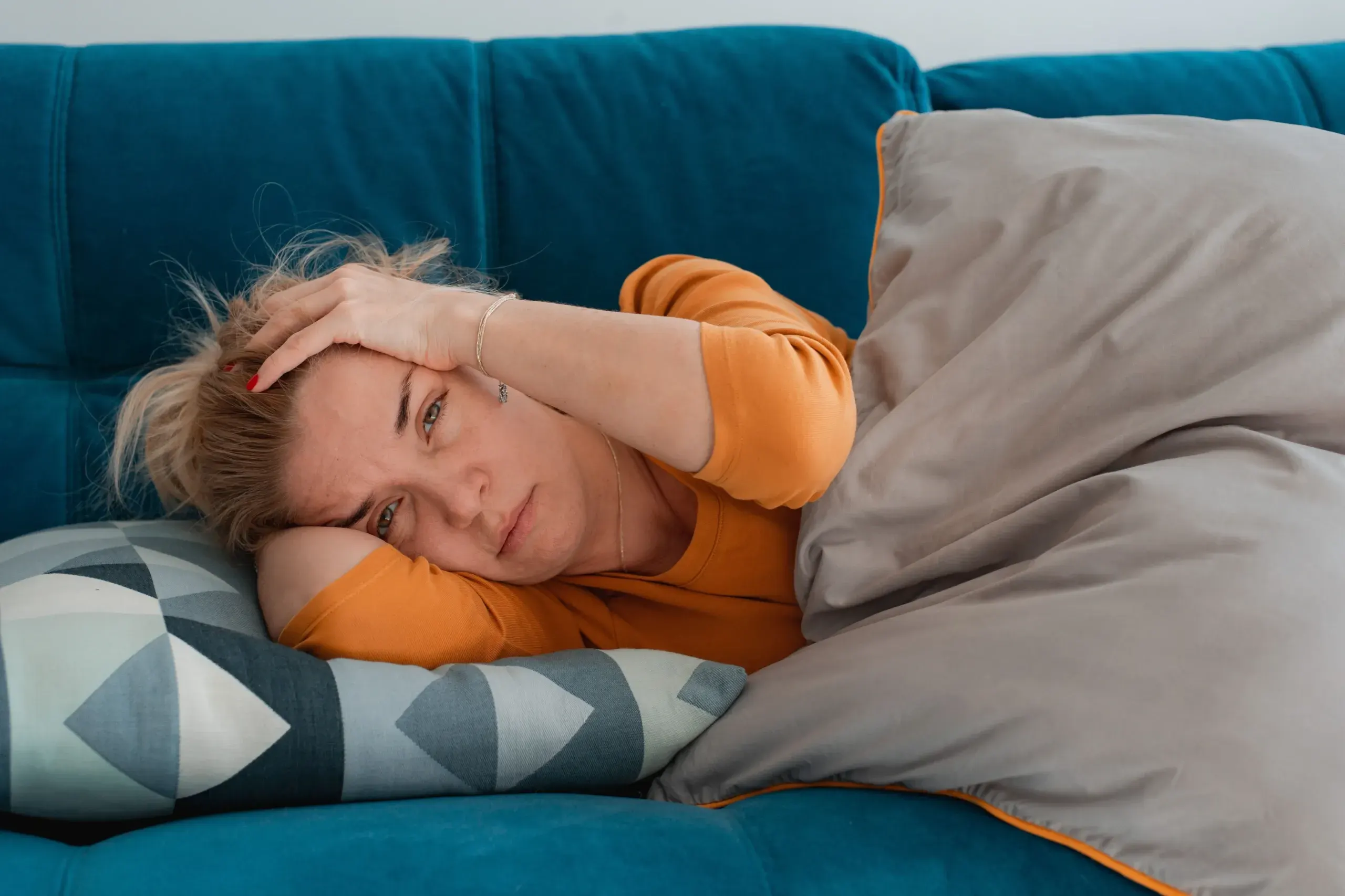 Infographic showing common chronic migraine triggers and causes