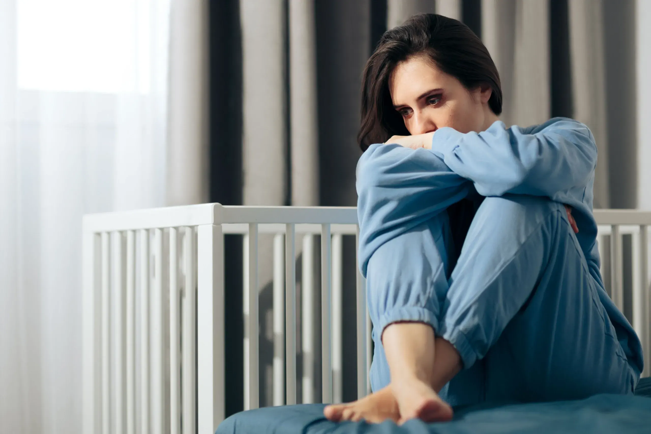 Mother receiving compassionate postpartum depression treatment at West Eastern Health in Ponte Vedra Beach
