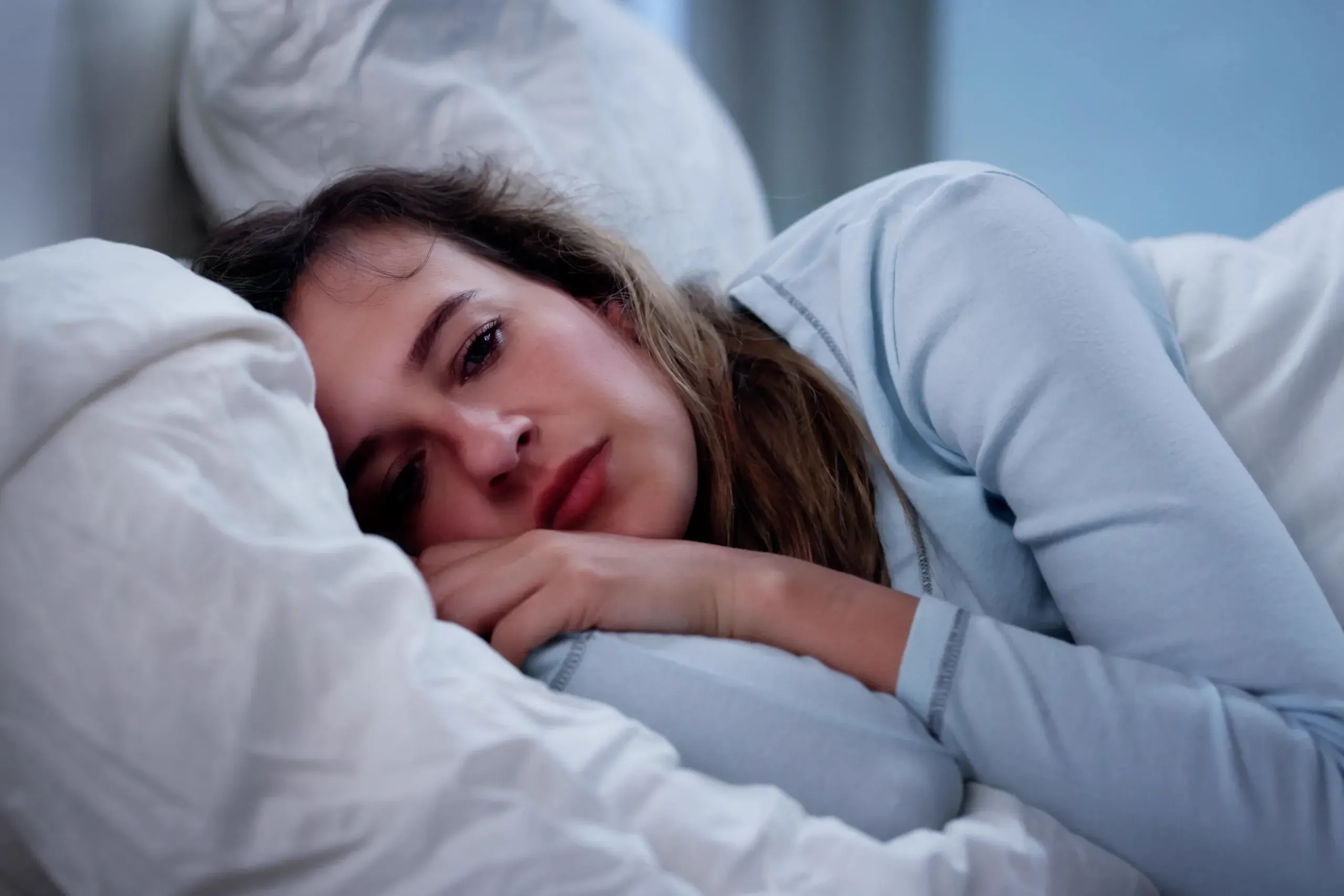 Patient experiencing restful, restorative sleep after sleep disorder treatment